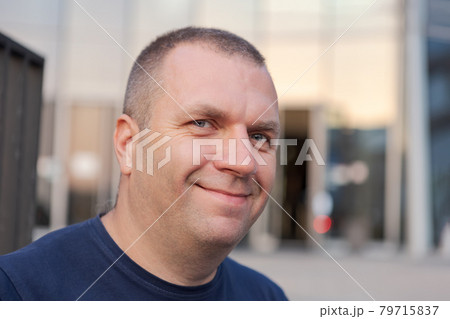 Face of smiling mature European man of large build. Face of smiling mature European man of large build. 79715837