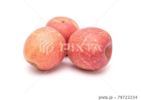 Fuji apples isolated on white background. Healthy food concept Fuji apples isolated on white background. Healthy food concept 79722234