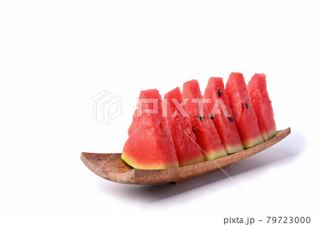 Fresh sliced watermelon on wooden plate. 79723000