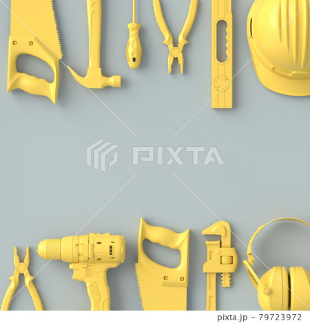 Top view of monochrome construction tools for repair on grey and yellow 79723972