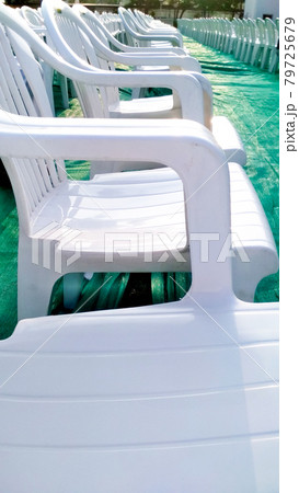 Rows of empty white chairs waiting for the audience Rows of empty white chairs waiting for the audience 79725679