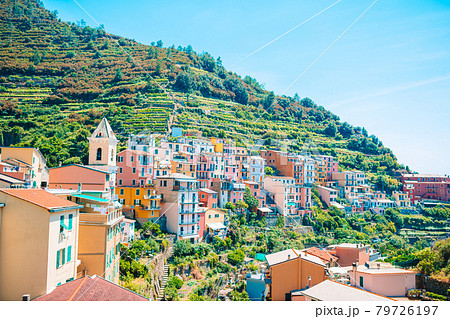 Beautiful cozy bay with boats and clear turquoise water in Italy 79726197