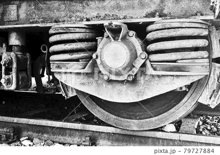 Springs of a historical railway car, black and white with hard contrast Springs of a historical railway car, black and white with hard contrast 79727884