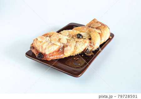 Breads with a golden crust on background. 79728501