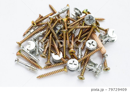 Screws on a white background. Screws on a white background. 79729409