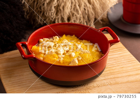 Elarji porridge from coarse cornmeal with Sulguni cheese 79730255