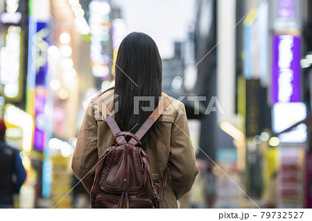 Young asian woman traveler traveling and shopping in Myeongdong street 79732527