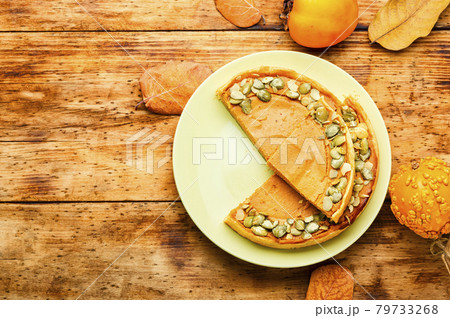 Homemade autumn pumpkin pie,space for text 79733268
