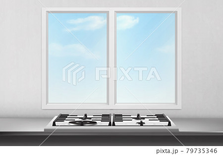 Gas and electric stove front of kitchen window 79735346