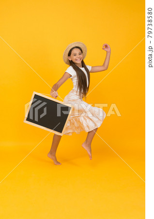 Happy girl child summer hat hold chalkboard copy space, active leisure concept 79738580