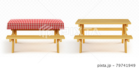Wooden picnic table with benches and tablecloth Wooden picnic table with benches and tablecloth 79741949