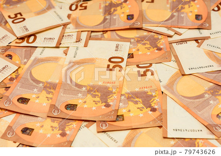 European currency in the face of fifty euros, saving money in foreign currency. European currency in the face of fifty euros, saving money in foreign currency. 79743626