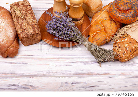 Rural breakfast with fresh bread. Fresh homemade Italian bread. Rural breakfast with fresh bread. Fresh homemade Italian bread. 79745158