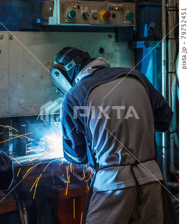 Welder working steel Welder working steel 79752451