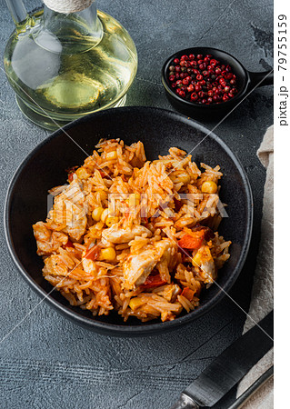 Enchilada with tomato rice, a mexican recipe, on gray background Enchilada with tomato rice, a mexican recipe, on gray background 79755159