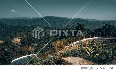 The famous view point and that tourists must stop by to check in.That is Folding cloth road of road among the mountains at Nan, Thailand. The famous view point and that tourists must stop by to check in.That is Folding cloth road of road among the mountains at Nan, Thailand. 79761178