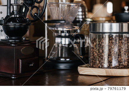 Vintage hand coffee grinders in a coffee shop. Classic cafe, Selective Focus. Vintage hand coffee grinders in a coffee shop. Classic cafe, Selective Focus. 79761179