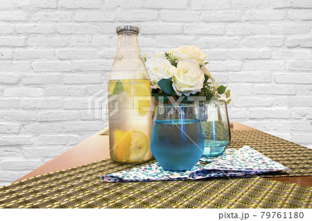 A set of drinks on the table with white wall background. A set of drinks on the table with white wall background. 79761180