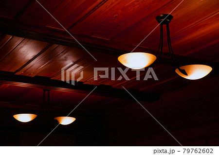 Lamps on the wooden ceiling in the room. Lamps on the wooden ceiling in the room. 79762602