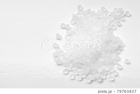 Close up picture of polypropylene granules, selective focus. Close up picture of polypropylene granules, selective focus. 79763837