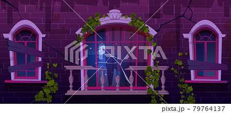 Old haunted house with woman ghost in window 79764137
