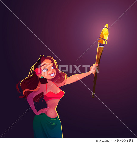 Young woman holding lighting torch, night party 79765392