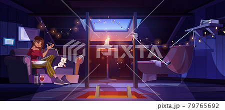 Young woman at home attic writing at night time 79765692