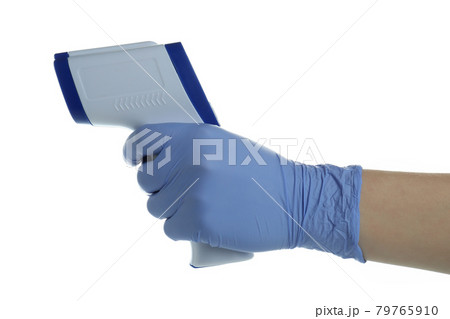 Hand in glove hold thermometer gun, isolated on white background 79765910