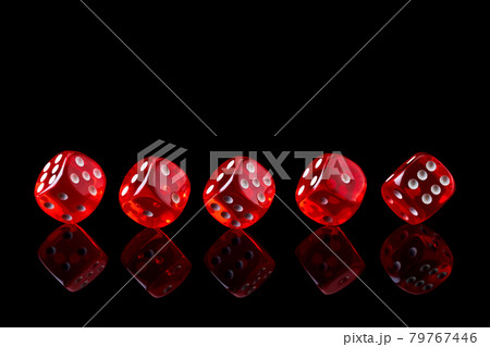 Red casino dice isolated over black reflective background 79767446