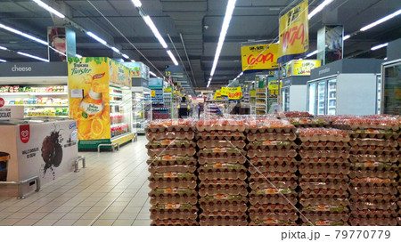 SEREMBAN, MALAYSIA -MARCH 16, 2021: Interior of a huge hypermarket. Daily necessities and groceries are displayed on sales shelves and price tagged. Sorted by type and brand. 79770779