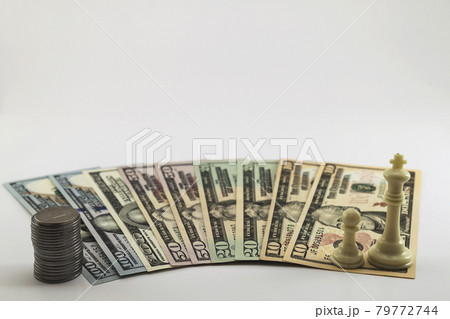 US american dollar money bills and coins cents spread on white background US american dollar money bills and coins cents spread on white background 79772744