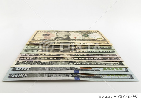 US american dollar money bills spread on white background US american dollar money bills spread on white background 79772746