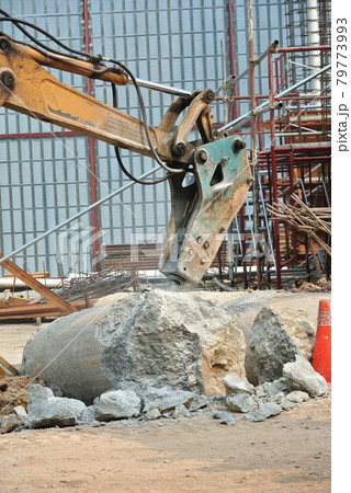 JOHOR, MALAYSIA -JUNE 26, 2016: Concrete hacking machine used to crush waste concrete to small pieces at the construction site in Malaysia. 79773993
