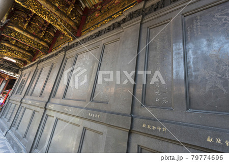 Golden Buddha at the main altar inside Longshan Temple in Taipei, Taiwan. 79774696
