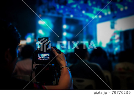 silhouette videographer had been recorded to blurred and bokeh countdown concert., Bangkok, Thailand. 79776239