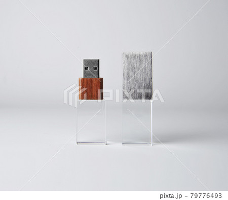 Silver metal wood USB flash drive isolated on gray background Silver metal wood USB flash drive isolated on gray background 79776493