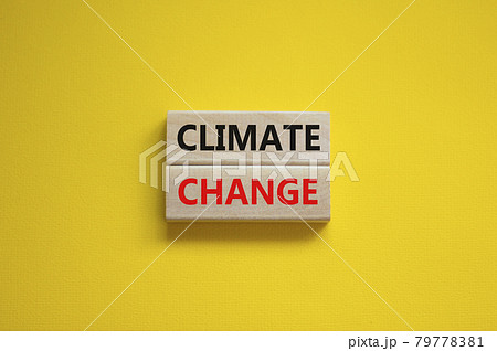 Climate change symbol. Wooden blocks with words 'Climate change' on beautiful yellow background. Business, ecological and climate change concept. Copy space. Climate change symbol. Wooden blocks with words 'Climate change' on beautiful yellow background. Business, ecological and climate change concept. Copy space. 79778381