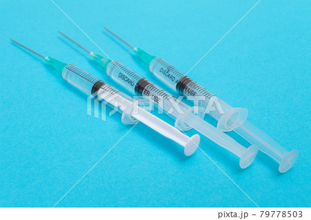 Several Syringe on Blue Table 79778503