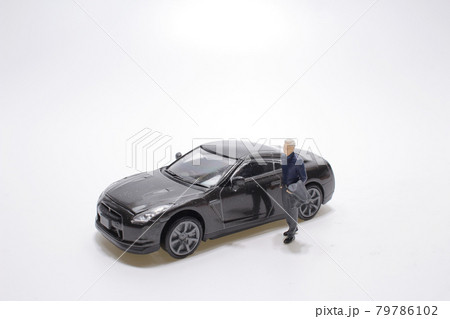 the Tiny small business figure with car the Tiny small business figure with car 79786102