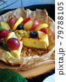 Cutting Cheesecake Topping with Summer Fruits 79788105
