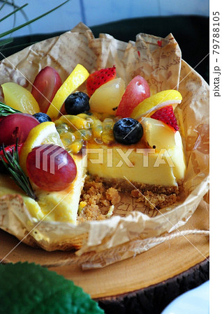 Cutting Cheesecake Topping with Summer Fruits Cutting Cheesecake Topping with Summer Fruits 79788105