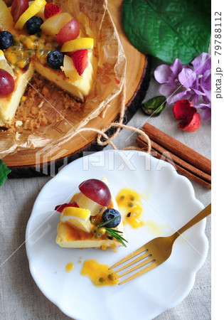 A piece of New York Cheese Cake Topping with Summer Fruits A piece of New York Cheese Cake Topping with Summer Fruits 79788112