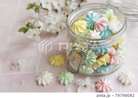 Small colorful meringues in the glass jar Small colorful meringues in the glass jar 79790082