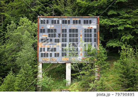Abandoned winter olympic site at the ski jumping large hill in Saint-Nizier du Moucherotte, France Abandoned winter olympic site at the ski jumping large hill in Saint-Nizier du Moucherotte, France 79790895