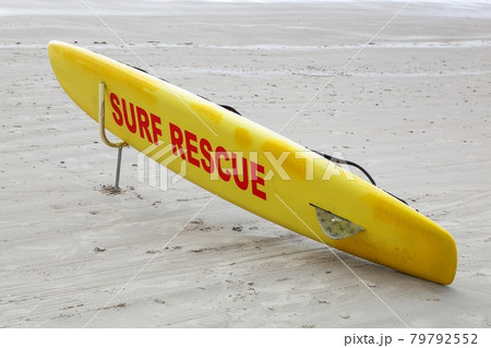 Surf rescue on a beach Surf rescue on a beach 79792552
