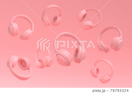 Flying gamer headphones or headset on pink background Flying gamer headphones or headset on pink background 79793324