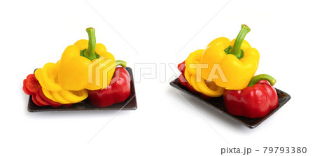 Top view of bell peppers. Fresh vegetables. Raw organic healthy food. Grocery and supermarket cooking and eating isolated on white background. Top view of bell peppers. Fresh vegetables. Raw organic healthy food. Grocery and supermarket cooking and eating isolated on white background. 79793380