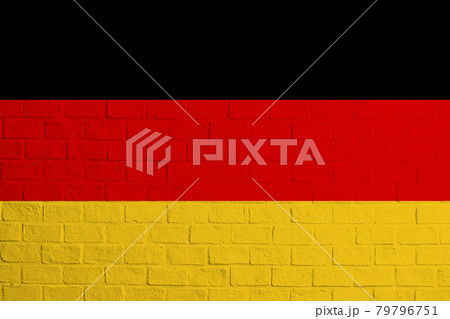 Flag of Germany. Brick wall texture of the flag of Germany 79796751
