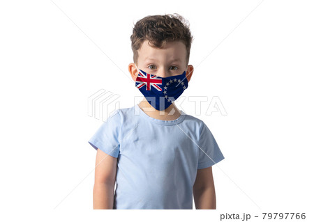 Respirator with flag of Cook Islands. White boy puts on medical face mask isolated on white background 79797766