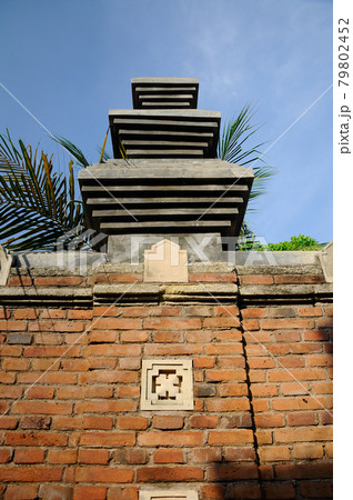 Stone work design and detail at Stone carving work with Javanese and Hindu influences. Located in the Old Grand Mosque of Mataram Kotagede, Jogjakarta Indonesia. Was build circa 1575. Stone work design and detail at Stone carving work with Javanese and Hindu influences. Located in the Old Grand Mosque of Mataram Kotagede, Jogjakarta Indonesia. Was build circa 1575. 79802452